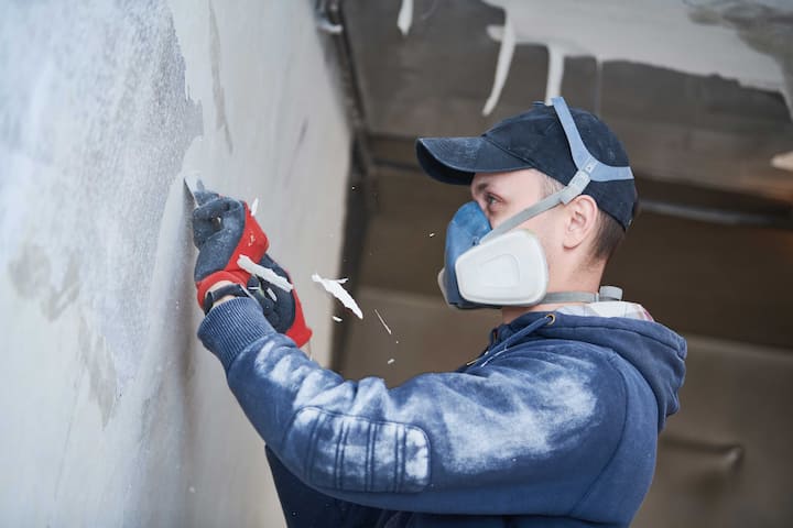 Fire repair specialist attending to a home.